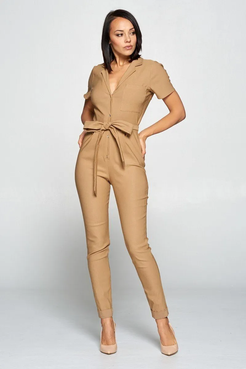 Short Sleeve Jumpsuit With A Notched Collar Neckline ,button Down Front, Pocket Detail Finished Off With A Self Tie Belt